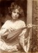 Plueschow,_Ragazzo_con_mandolino Chlapec s mandolínou, Guglielmo Plüschow (1907)
